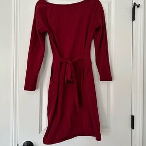 Wine colored 3/4 sleeved. Pockets and built in belt size Medium